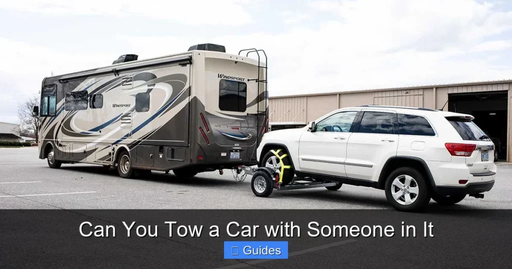 Can You Tow a Car with Someone in It